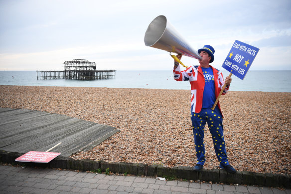 Anti-Brexit protester Steve Bray on a beach at Brighton, where the Labour conference is debating the party's stance on Brexit.