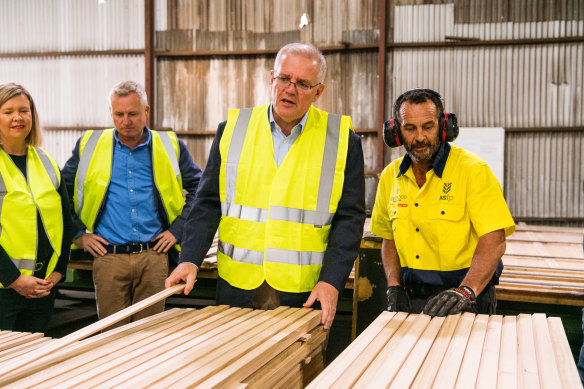 Liberal MP Bridget Archer, left, on the campaign trail with Tasmanian Premier Jeremy Rockliff and Prime Minister Scott Morrison.