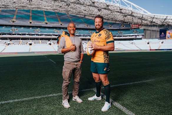 George Gregan and James Slipper standing at Accor Stadium last year ahead of the prop passing the record for most Wallabies caps.