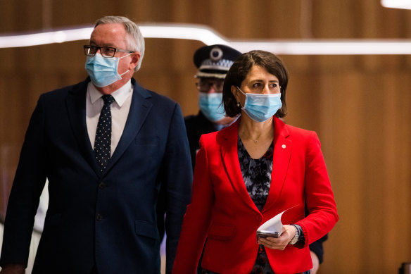 NSW Premier Gladys Berejiklian, Health Minister Brad Hazzard and Deputy Police Commissioner Gary Worboys arriving for today’s coronavirus update. 