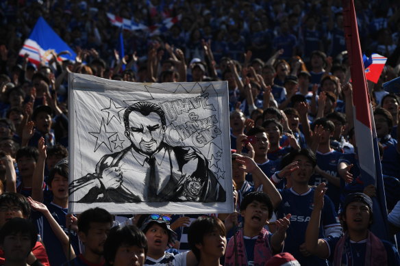 F. Marinos fans hold up a banner saluting Ange Postecoglou as "brave and challenging" in last year's J.League Levain Cup final against Shonan Bellmare.