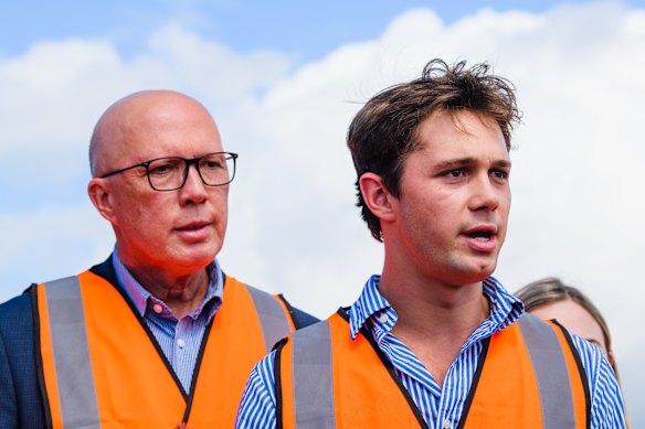 The opposition leader and his son Harry campaigning in Brisbane on April 14.