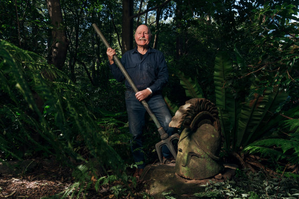 John Simpson at home in Beecroft with the Corinthian helmet and three-pronged trident held by Britannia.