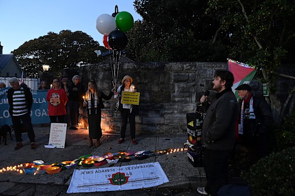 Ethan Floyd (right) speaks at a sunrise vigil held outside Kirribilli House in Sydney on May 20.