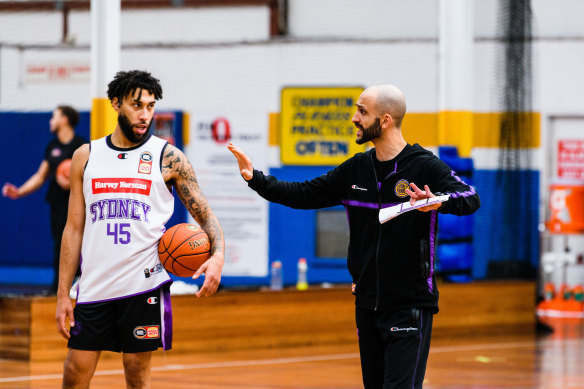 Abdelfattah gives instructions to import Denzel Valentine during pre-season training.