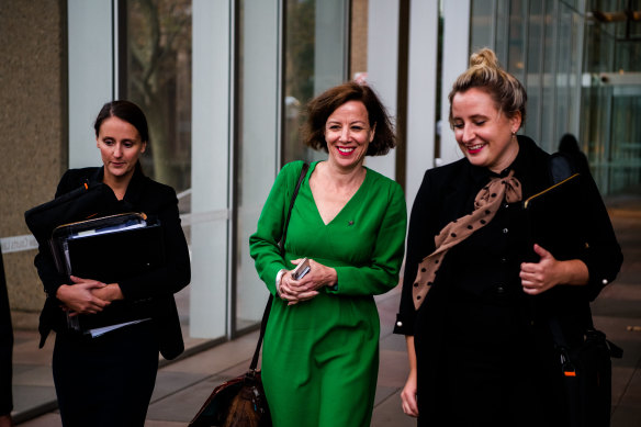 Jo Dyer, centre, outside court on Tuesday.