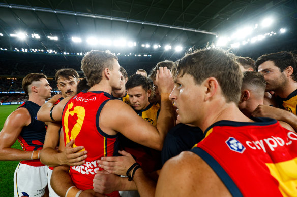 Jordan Dawson speaks to his players.