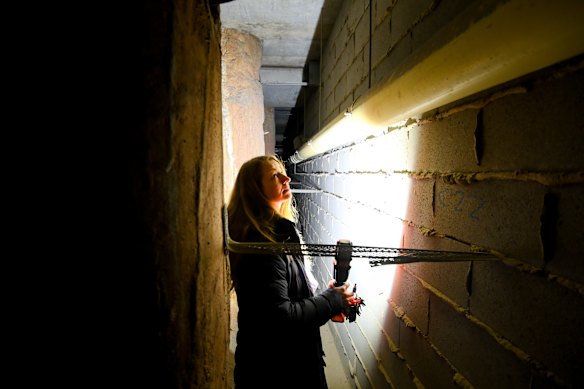 An unstable besser block wall in the building’s basement.