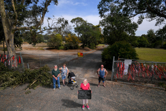 Kilsyth residents Shelly Large (centre), John Phillips and wife Carol with George Stephens (right) at the empty land on Cambridge Road.