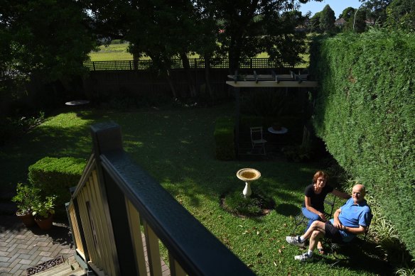 Bill and Carolyn Hiley in their Haberfield garden, which backs onto the disused army land.