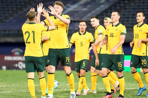 Harry Souttar, second from left, has backed the depth of the Socceroos squad preparing to face Vietnam.