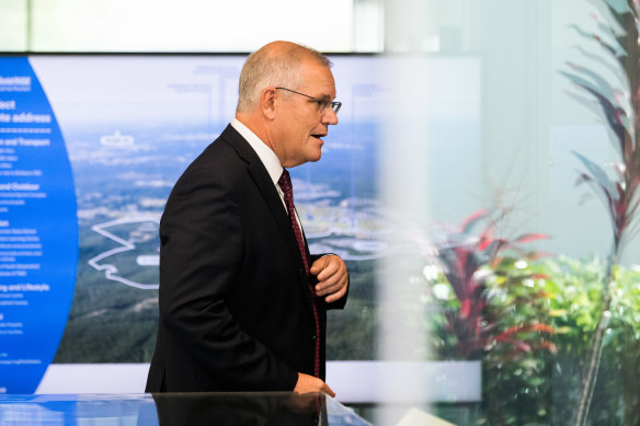 Prime Minister Scott Morrison visiting a new housing estate on Monday. 