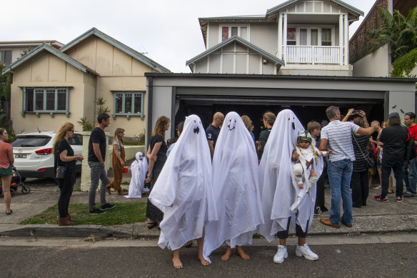 Trick or treaters line up in Bondi in 2018.