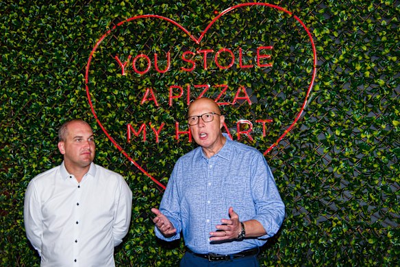 Opposition Leader Peter Dutton at a Cairns cafe on Saturday with Liberal candidate Jeremy Neal.