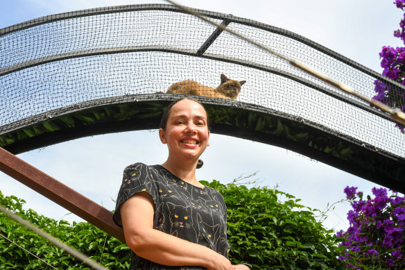 Kylie McKendry with her chocolate burmese cat, Marla.