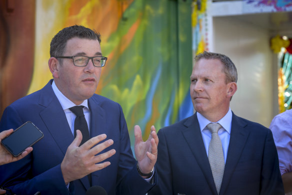 Premier Daniel Andrews, with Cricket Australia chief executive Kevin Roberts, speaking to reporters in 2018. 