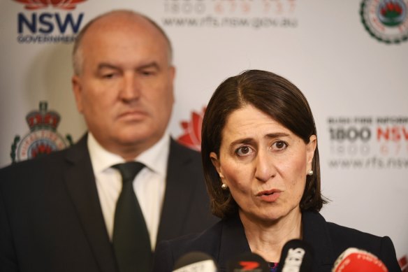 NSW Premier Gladys Berejiklian and Emergency Services Minister David Elliot received a morning bushfire briefing on Monday.