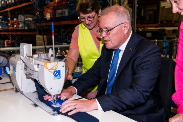 Prime Minister Scott Morrison with  Maria Grima during a visit to  manufacturing business SpanSet Australia in the seat of Lindsay in Sydney’s west on Wednesday. 