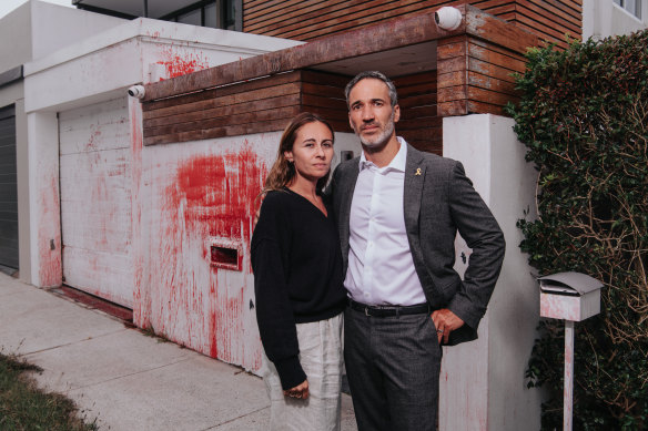 Alex Ryvchin and his wife Vicky at their former home, which was vandalised as antisemitic attacks surge in Sydney and Melbourne. He will attend the Auschwitz commemoration. 