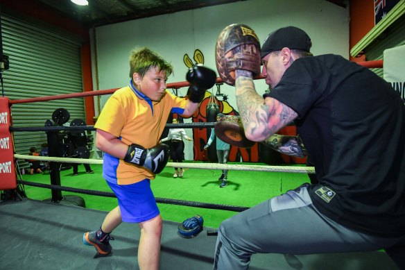 Levi, 11, trains with Jason Whateley at Pure Boxing.