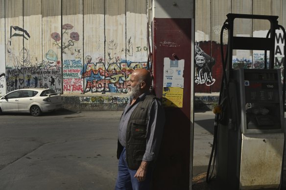 Mahmoud Abu Alia, 65, at the petrol station on the separation wall, where he has worked for 40 years in Bethlehem. 