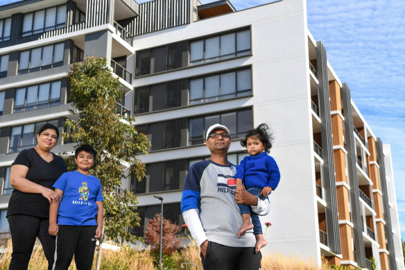 Geetika Mohindru with husband Pankaj Kumar and their two children  Vyussh Sinha (9) and Viaan Sinha (21 months) outside their home in Ryde.