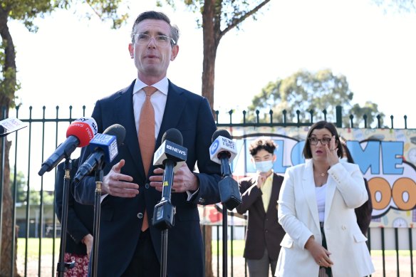 NSW Premier Dominic Perrottet and Education Minister Sarah Mitchell at Fairvale High School, in Fairfield West, on Monday.