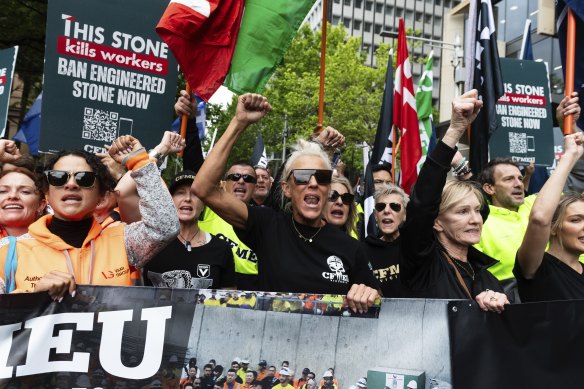 Unionists outside Parliament House in Sydney on Thursday demand a ban on engineered stone.