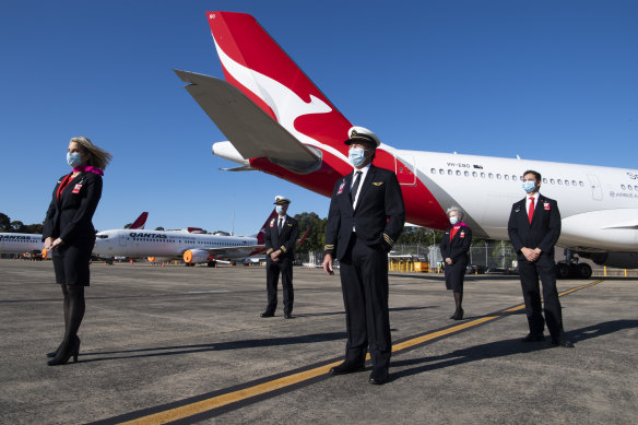 Qantas will no longer require masks on some international flights. 