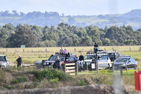 Onlookers lined the Princes HIghway to watch the eight chimneys on the former Hazelwood Power Station be demolished.