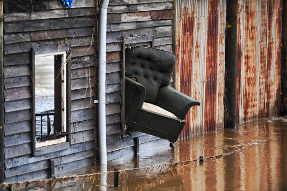 Scenes of destruction in Camden on Friday as the floodwaters recede.