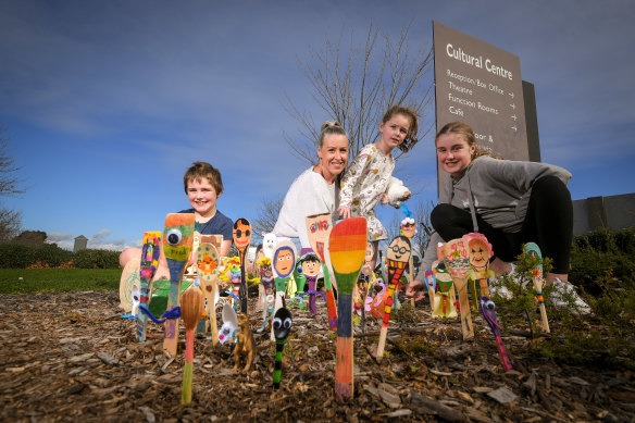 Flynn, Rebecca Ellis, Milla and Ashby take their decorated wooden spoons to a Spoonville at the Cardinia Cultural Centre.