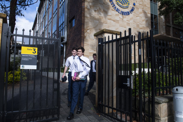 Waverley College students leave school after a student was diagnosed with COVID-19.
