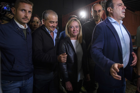 Giorgia Meloni, leader of the Fratelli d’Italia (Brothers of Italy), leaves the polling station after voting on Sunday.