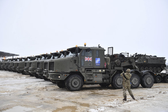 Tanks loaded on military trucks as a part of additional British troops and military equipment to arrive at Estonia’s NATO Battle Group base in Tapa on Friday.