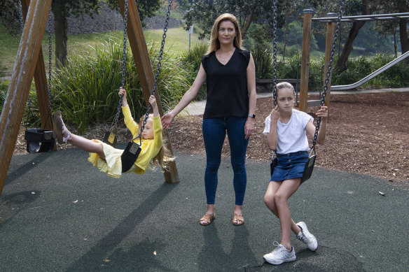 Shannon Ruddock with her daughters Abby and Maddie at the playground at  Bronte Beach. 