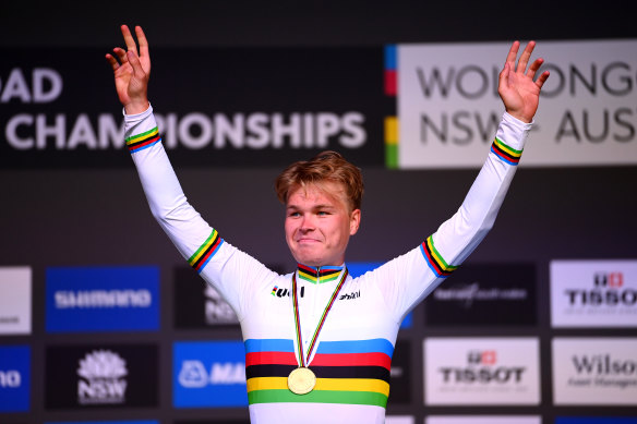 Tobias Foss displaying the fruits of his hard work ... the rainbow jersey.