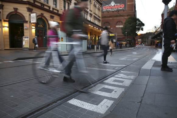 Cyclists face fines for riding along the light rail lines.