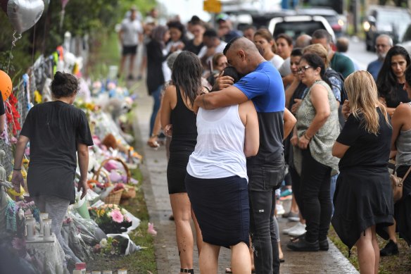 Emotional scenes at the site of Saturday's crash, in which four children were killed.