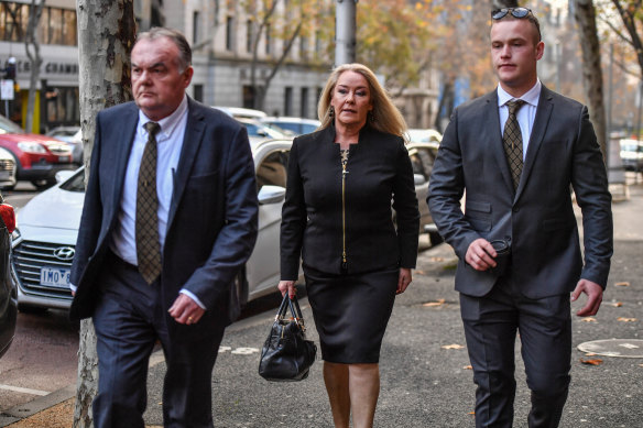 Sergeant Silk's brother Peter Silk, Senior Constable Miller’s widow Carmel Arthur and his son Jimmy Miller arrive at the Supreme Court on Tuesday.