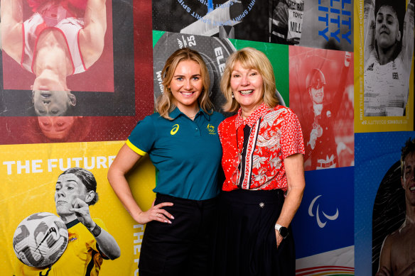 Harvey Norman CEO Katie Page with Olympic champion Ariarne Titmus. Ms Page wants corporates and government to make investment in sport a priority.