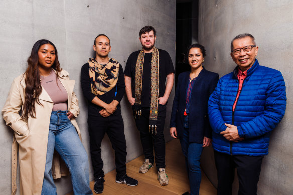 Biennale of Sydney artistic directors Inti Guerrero and Cosmin Costinas (centre), with artists Serwah Attafuah, Kirtika Kain and William Yang.