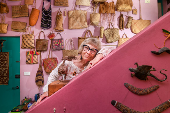 Emily Bullock, pictured at home in 2020, is among residents protesting plans to force out tenants and redevelop public housing in Glebe.