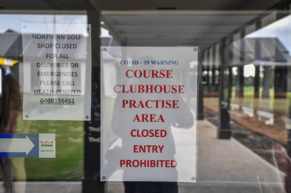 A sign on the pro shop tells the story at the Northern Golf Club. 