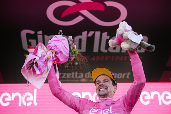 Primoz Roglic celebrates with the pink jersey.