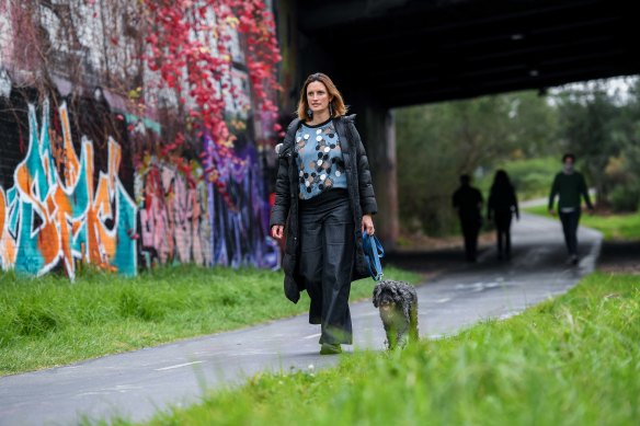 Anita Brown-Major walks her dog Molly.