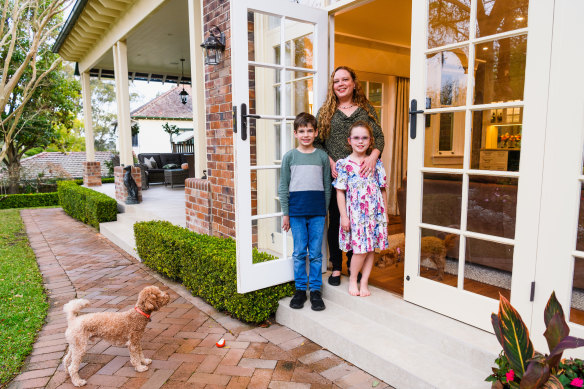Felicity Davidson with her two children, Hamish and Julia, in their Pymble home. 