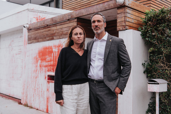 Alex Ryvchin, Co-CEO of The Executive Council of Australian Jewry, with his wife Vicky outside their former home in Dover Heights, which was vandalised overnight. 