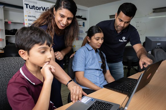Students Sharvil Pandir, 8, and
Shanaya Pandir, 11, with Jyoti Sachdeva (left) and Abhishek Narang from TutorWise in Quakers Hill. Sharvil is preparing for his first NAPLAN test.
