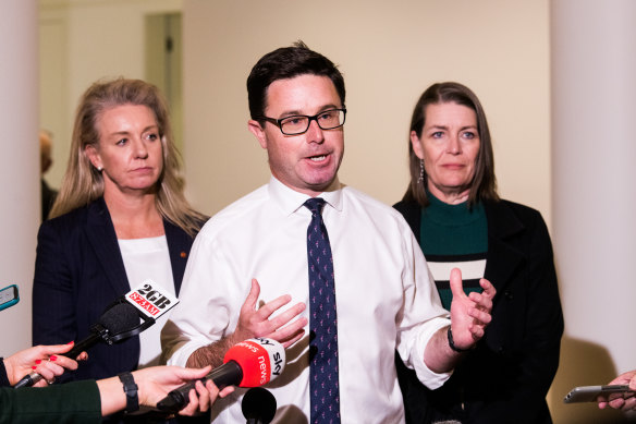 David Littleproud, with senator Bridget McKenzie (left) and new deputy Perin Davey, says he believes co-operating with the Liberals on climate change is the only path back to government for the Nationals.